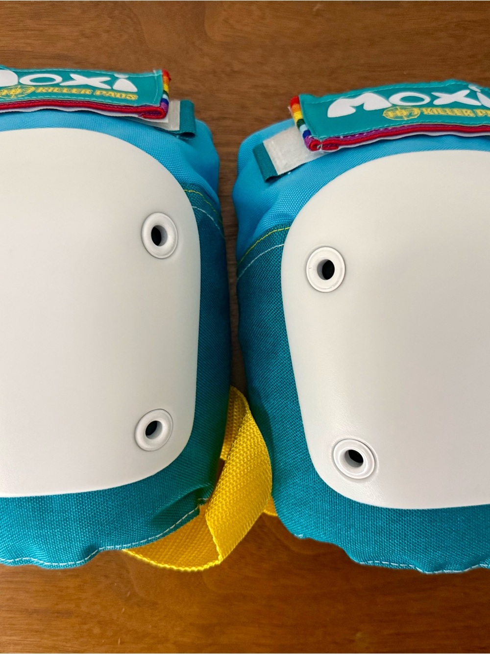 Moxi Roller Skates Teal Wrist, Elbow, and Knee Pad Set with Rainbow Accents - Picture 2 of 4